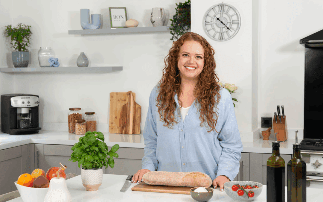 Naomi in kitchen preparing food